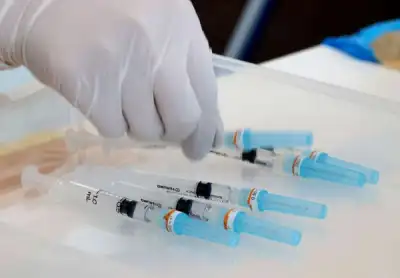 Image for Japan eyes mixed use of COVID-19 shots to speed vaccine rollout