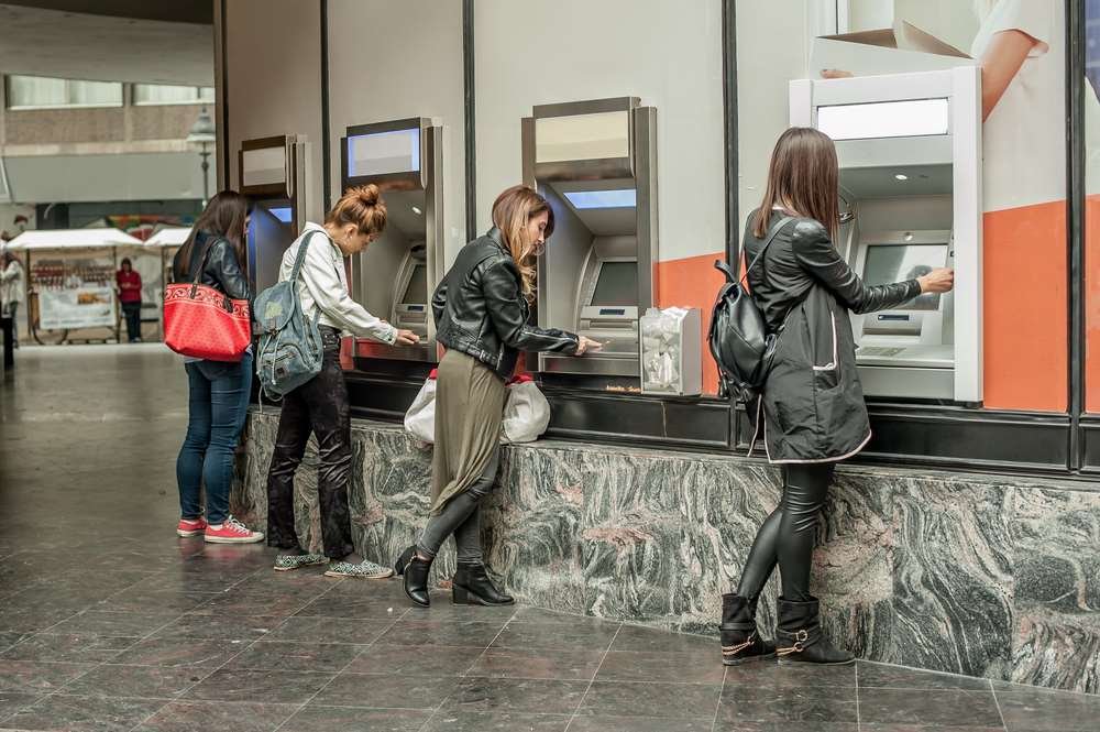 Recycling ATM in a bank setting, symbolizing growth in Latin America's banking sector - Global Banking & Finance Review