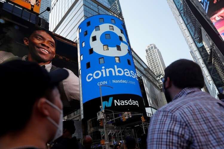 Image for Coinbase, Binance resist calls to kick Russians off crypto platforms