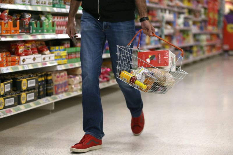 Image for UK shoppers pick up their spending, signalling quick end to recession