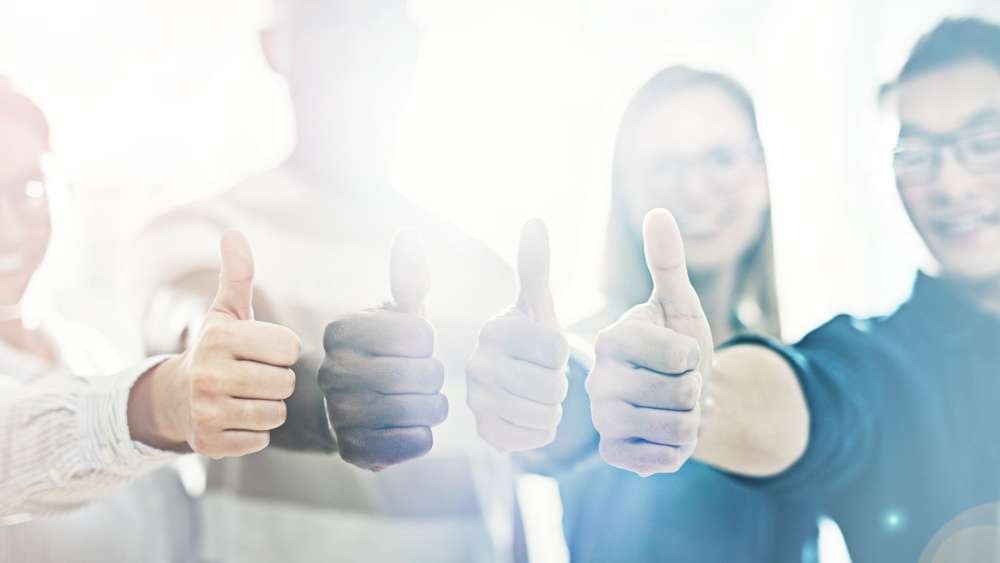 Diverse team discussing workplace inclusion challenges - Global Banking & Finance Review