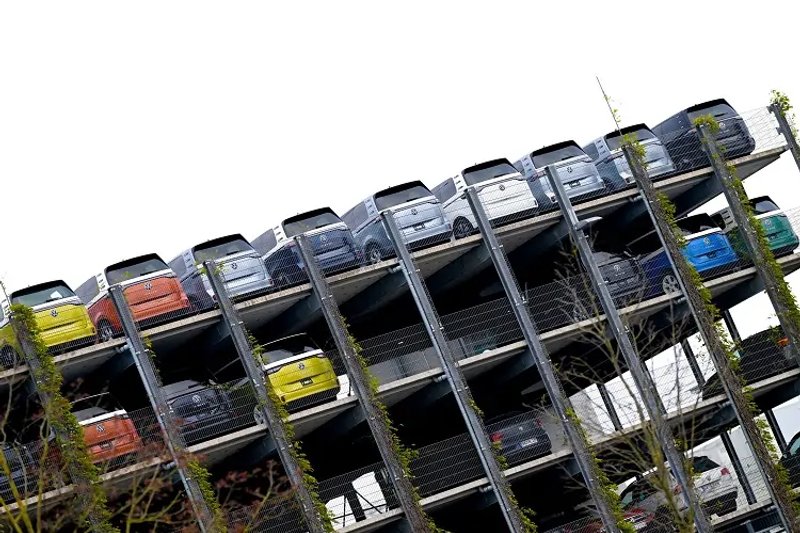 Image for Volkswagen, unions continue talks over plant closures and pay cuts, sources say