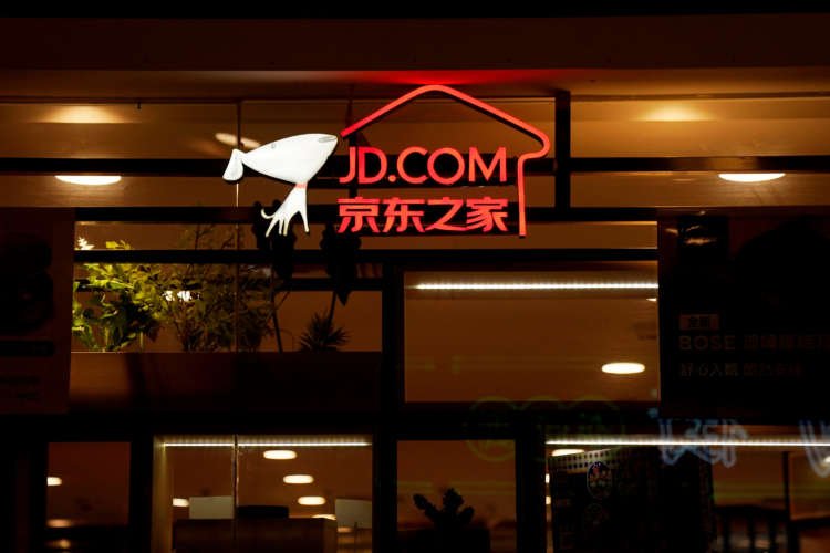 Exclusive: China’s JD.com in talks to buy stake worth $1.5 billion in brokerage – sources