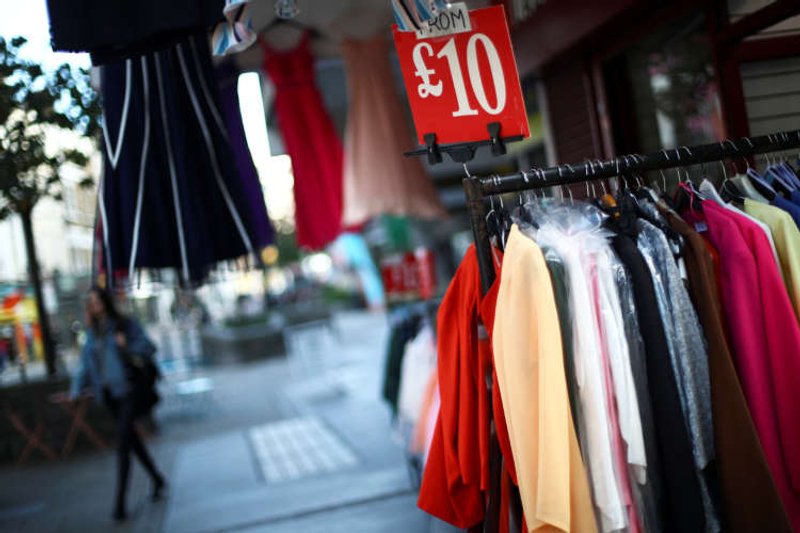 Image for Slump in clothes prices causes surprise UK inflation dip