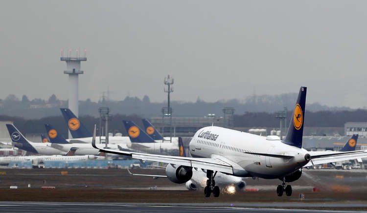 Planes of German air carrier Lufthansa are seen at the airport in Frankfurt