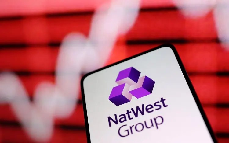 NatWest bank logo with financial graphs illustrating profit decline - Global Banking & Finance Review