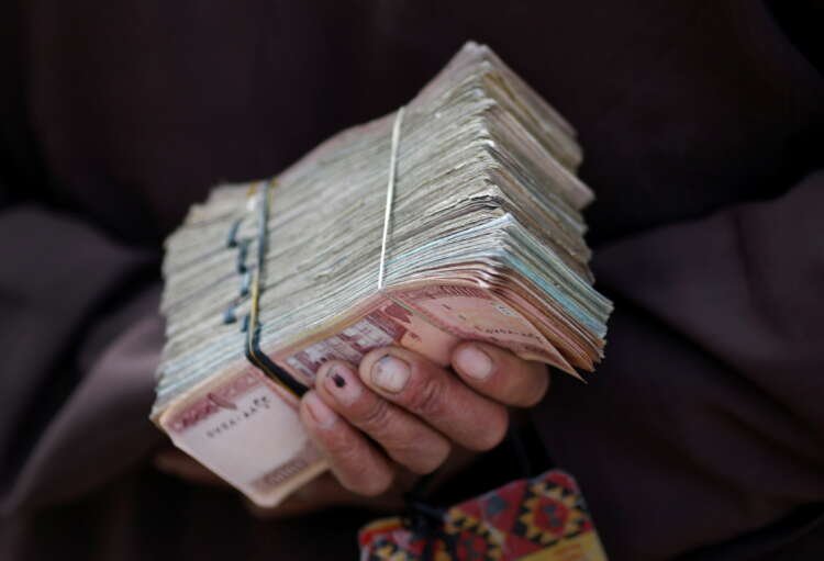 Image for Afghanistan remittance payouts limited to local currency -sources