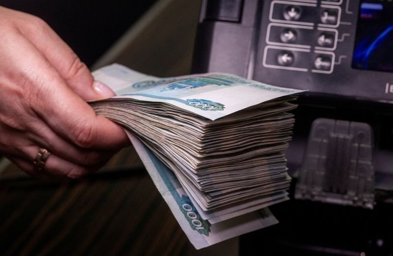 An illustration of the Russian rouble currency weakening ahead of Russia-US talks - Global Banking & Finance Review