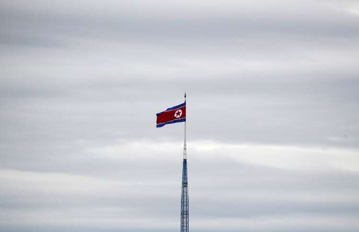 North Korean flag waving over Gijungdong village amid missile launch tensions - Global Banking & Finance Review
