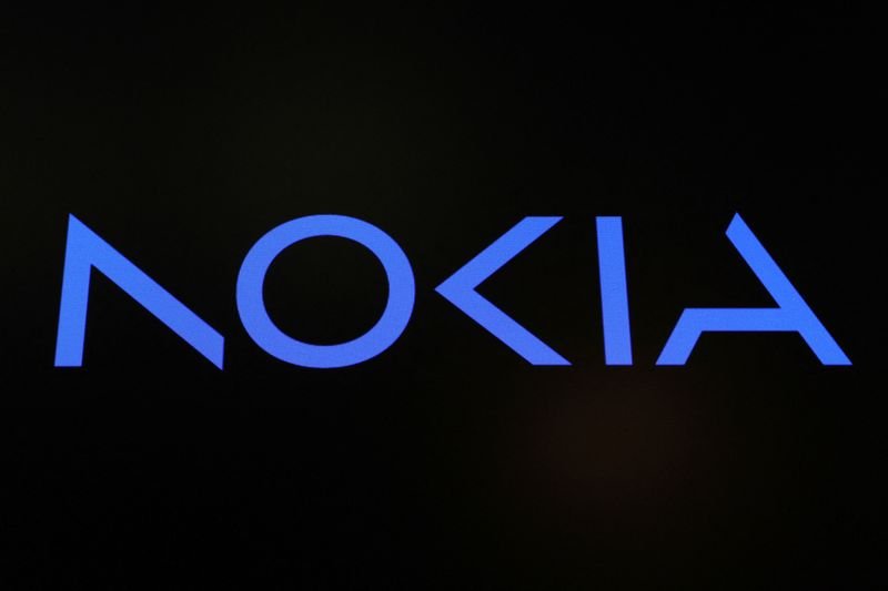 Nokia and AT&T logos symbolizing their multi-year expansion deal - Global Banking & Finance Review