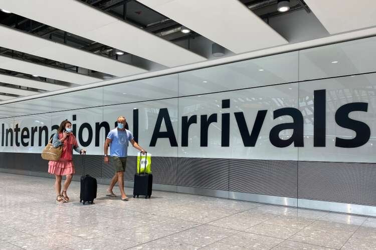 Passengers arriving at Heathrow Airport amid travel recovery efforts - Global Banking & Finance Review