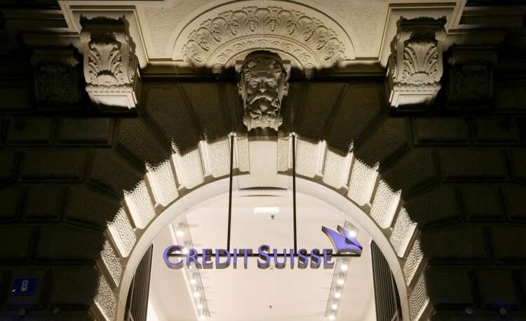 Credit Suisse logo at headquarters, reflecting its market position amid bond refinancing - Global Banking & Finance Review
