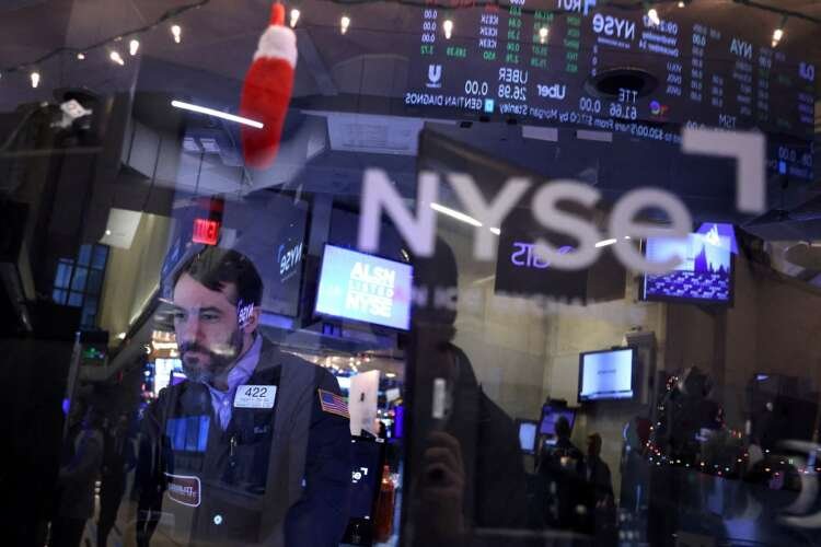 Image for Stocks, bonds extend rally on hopes rate hikes ease