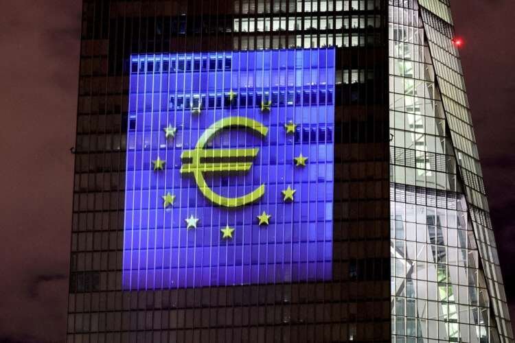 Illuminated ECB headquarters symbolizing climate risk assessment - Global Banking & Finance Review