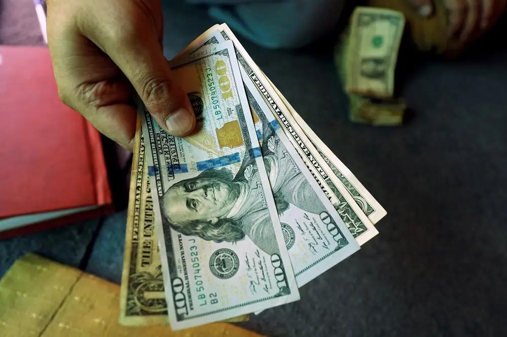 Image for Dollar slips ahead of data, set for first monthly drop in 2024