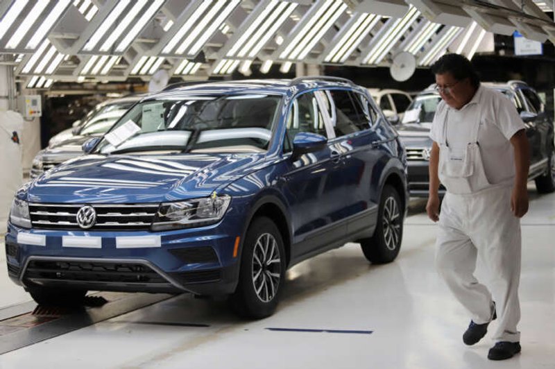 Image for Volkswagen’s Mexico unit says it will resume production that was hit by chip shortage