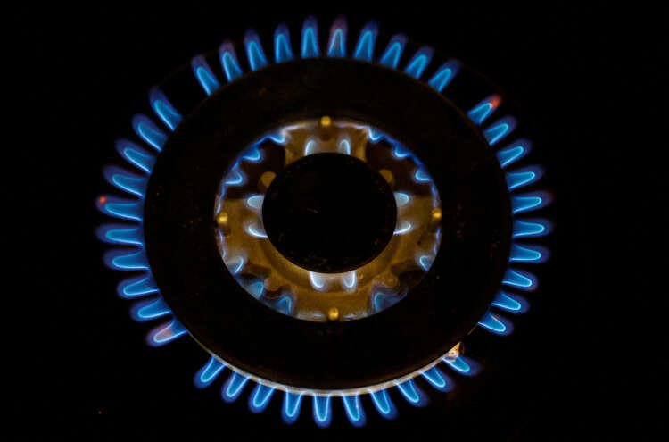 Flames from a gas burner symbolizing energy costs in British households - Global Banking & Finance Review