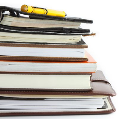 Books and resources symbolizing the rebranding of Decision Recruitment to Ionic - Global Banking & Finance Review