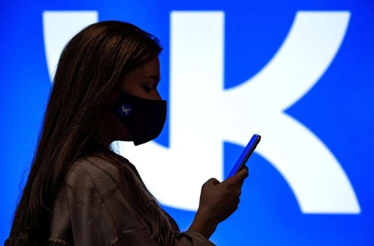 Employee of Russian tech company VK using smartphone at headquarters - Global Banking & Finance Review