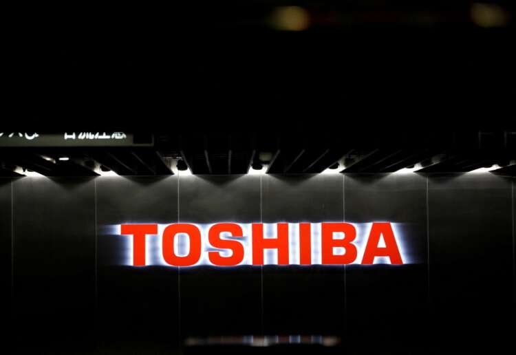 Toshiba logo at their facility, representing quantum-secured network collaboration - Global Banking & Finance Review
