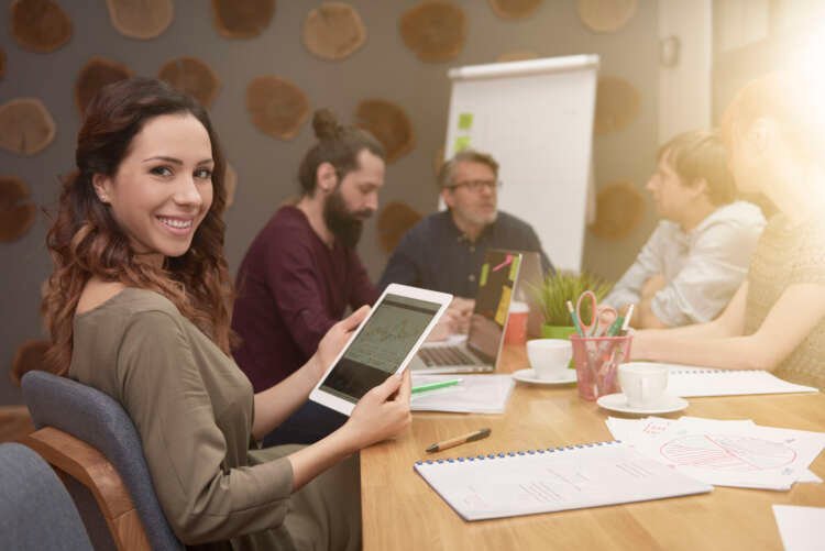 Smiling woman during the business meeting
