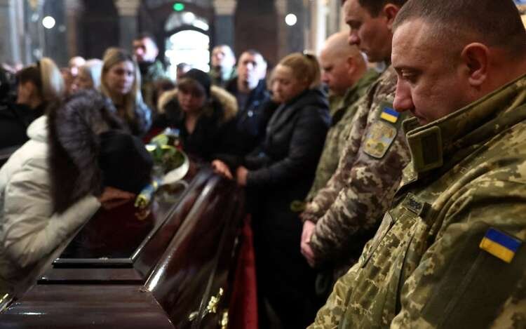Memorial service for fallen soldiers amid the Ukraine-Russia conflict - Global Banking & Finance Review