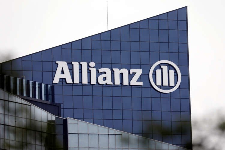Allianz SE logo displayed on the building, representing insurers' exit from climate alliance - Global Banking & Finance Review
