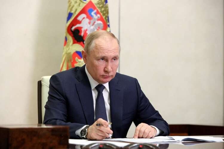 Russian President Putin during a meeting discussing Ukraine conflict - Global Banking & Finance Review