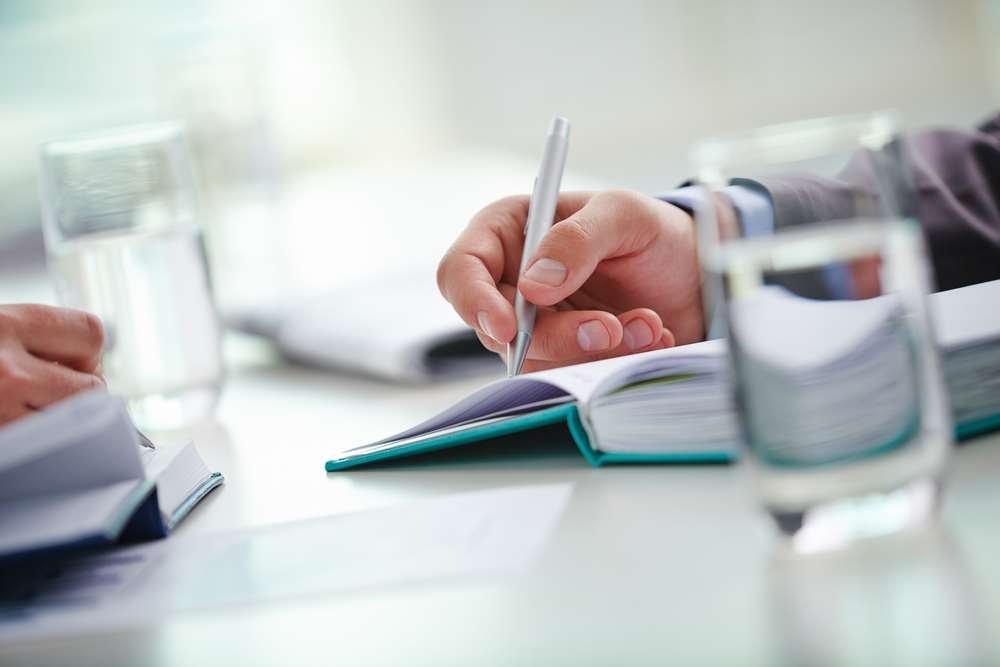 Student working at a campus job, illustrating the concept of Work Study - Global Banking & Finance Review