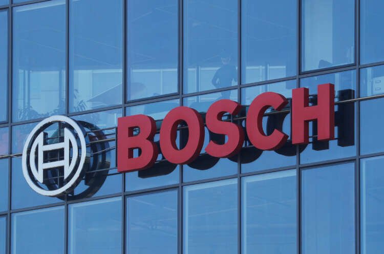 Bosch logo at office building, symbolizing joint venture for German wafer fab - Global Banking & Finance Review