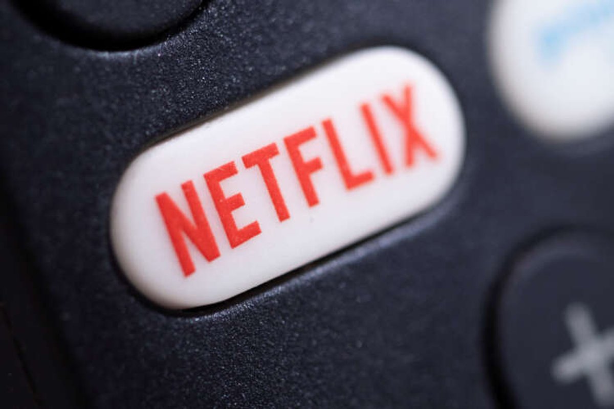 Netflix logo on a remote controller, symbolizing subscription changes - Global Banking & Finance Review