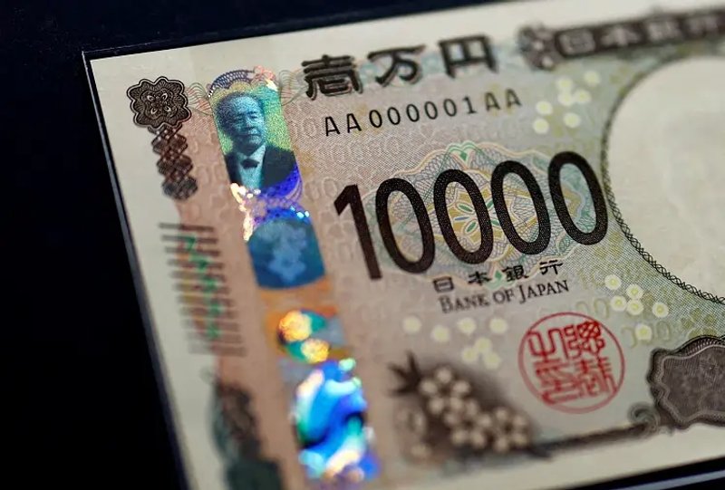 Image for Dollar firms against yen as BOJ leaves open timing of hikes