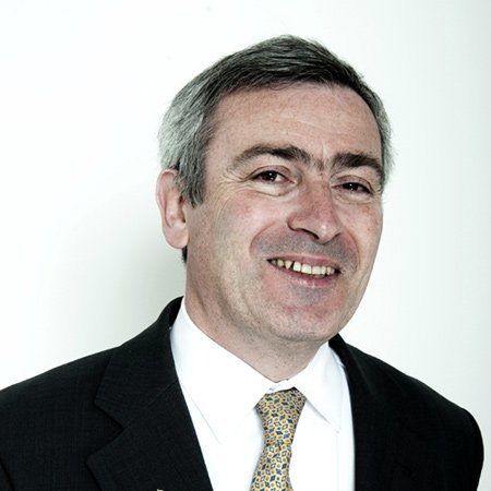 Professional meeting discussing corporate decision-making - Global Banking & Finance Review