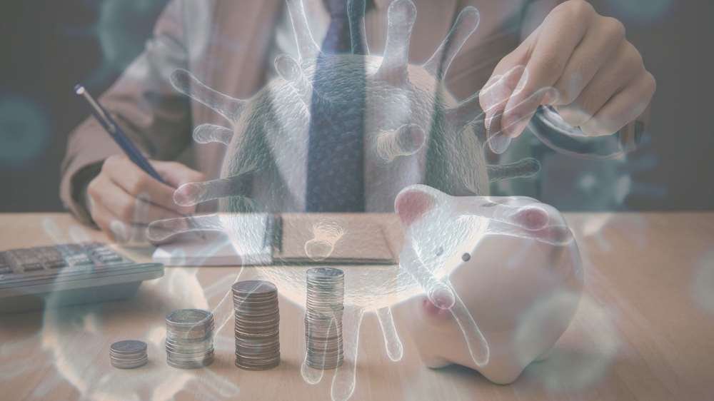 Business professionals discussing financial strategies during COVID-19 - Global Banking & Finance Review