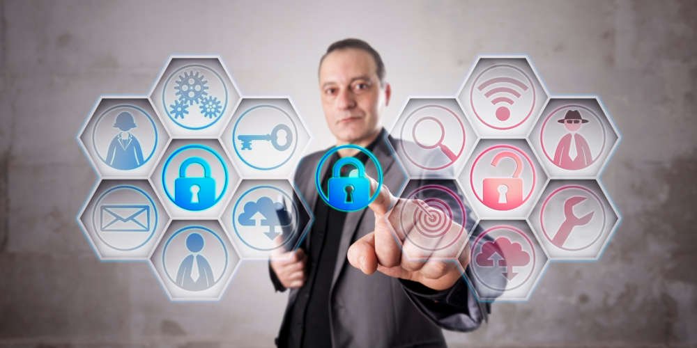 Businessman Closing A Lock To Secure Information