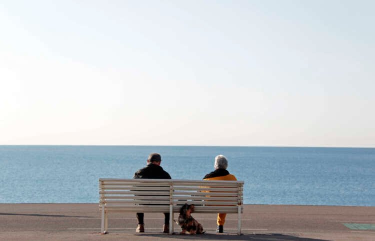 Elderly people relaxing in Nice, symbolizing France's pension reform challenges - Global Banking & Finance Review