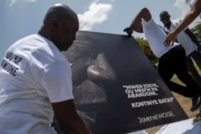 Image for Haitians protest, pay tribute as country grapples with president’s killing