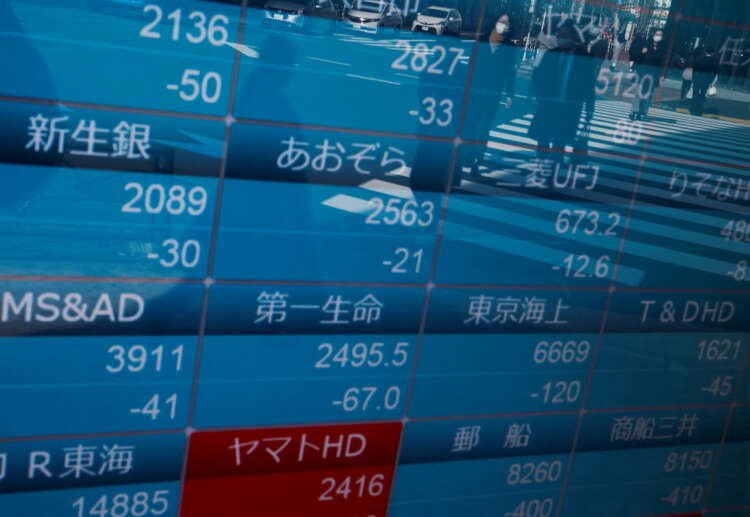 Stock market board in Tokyo reflecting investors' concerns over Asian stocks - Global Banking & Finance Review