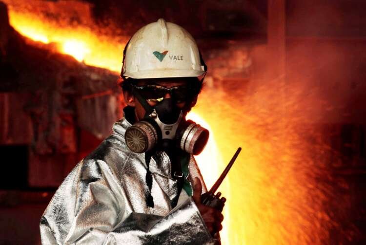 Worker monitoring nickel melting process at a smelter amid LME nickel trading crisis - Global Banking & Finance Review