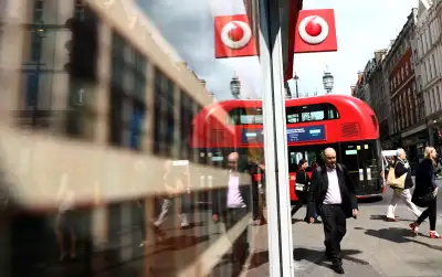 Image for UK watchdog refers Vodafone, Three deal to in-depth probe
