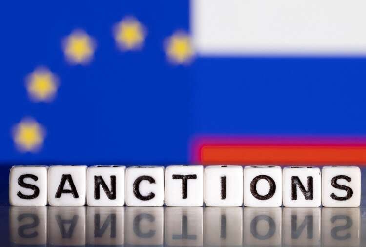 Illustration of 'Sanctions' against Russia with EU flag colors, highlighting EU's oil embargo - Global Banking & Finance Review