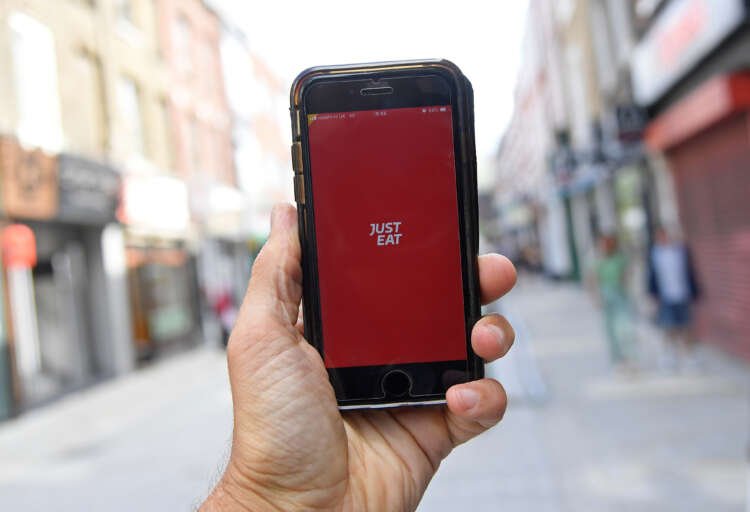 Image for Just Eat Takeaway raises 2023 guidance, launches buyback