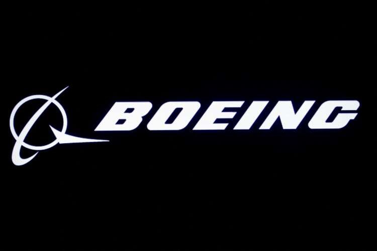 Boeing logo displayed on a screen, reflecting company's financial status - Global Banking & Finance Review