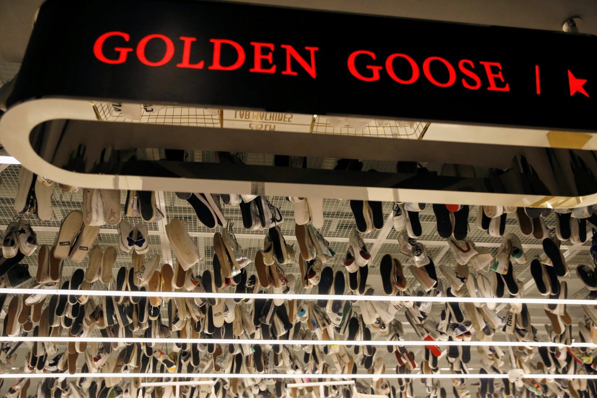 Golden Goose logo with luxury sneakers representing Milan IPO for $2 billion - Global Banking & Finance Review