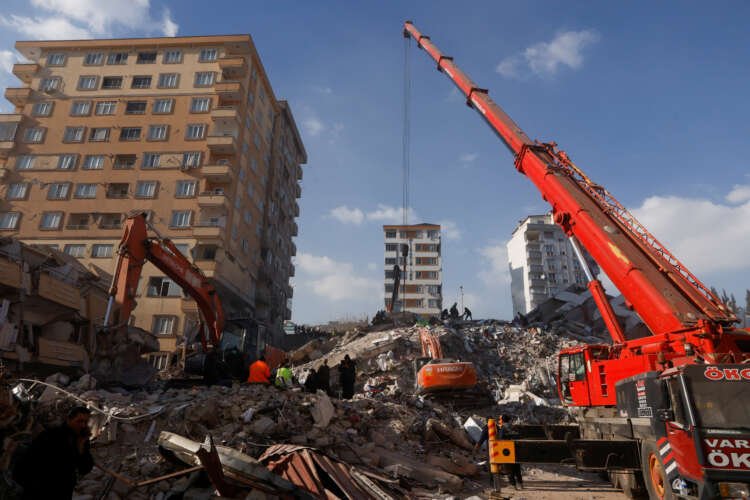 Cranes remove debris from collapsed buildings after Turkey's earthquake - Global Banking & Finance Review