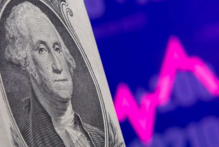 Image for Dollar hovers near one-month high with market frozen before Fed test