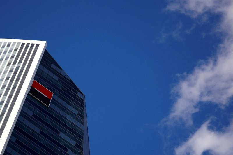 SocGen logo with stock market graphics symbolizing profit jump - Global Banking & Finance Review