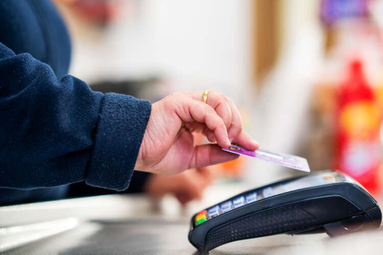Close-up of a contactless payment being processed at a POS terminal - Global Banking & Finance Review
