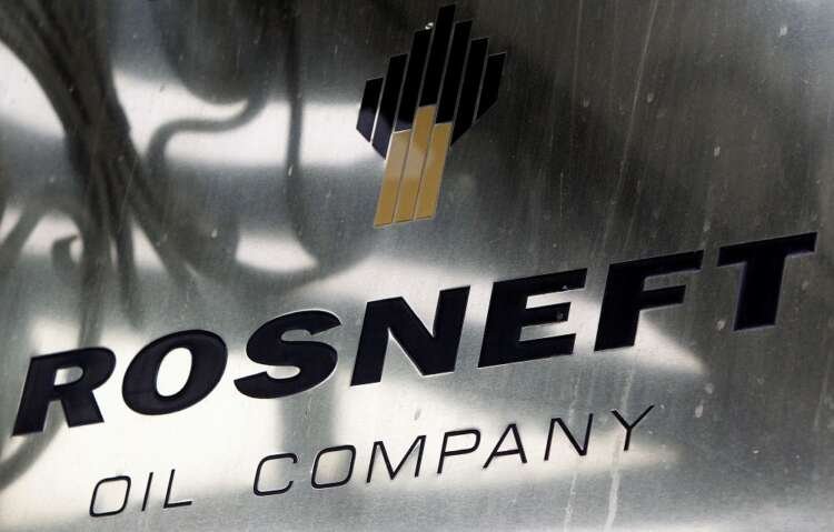 FILE PHOTO: A logo of Russian state oil firm Rosneft is seen at its office in Moscow
