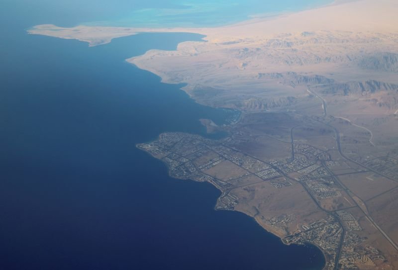 Container ships navigating through marine routes affected by Red Sea diversions - Global Banking & Finance Review